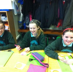 Zoe, Sophie and Abbie making spinning tops