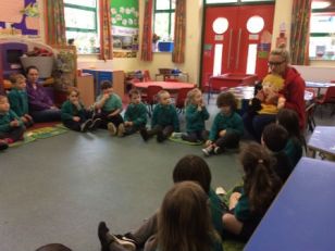 The nursery children enjoying Jo Jingles.